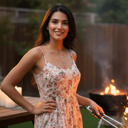 Layered necklace featuring pink and blue enamel with a Chai and Star of David charm, accented by glistening diamond-like gems.