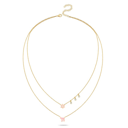 Layered necklace with pink and blue enamel, featuring Star of David and Chai charms, accented by diamond-like gems for a timeless look.