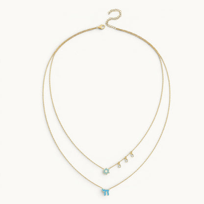 Layered necklace in gold with pink enamel Chai and Star of David charms by Alef Bet