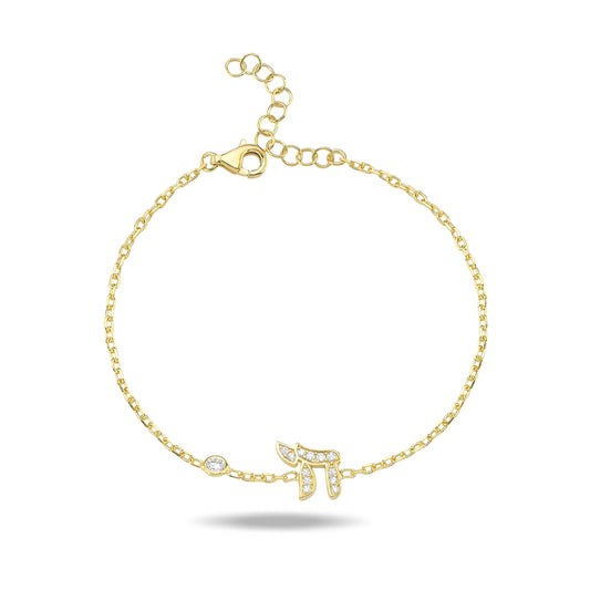 Solid 14k gold chai bracelet with pave diamond accents by Alef Bet