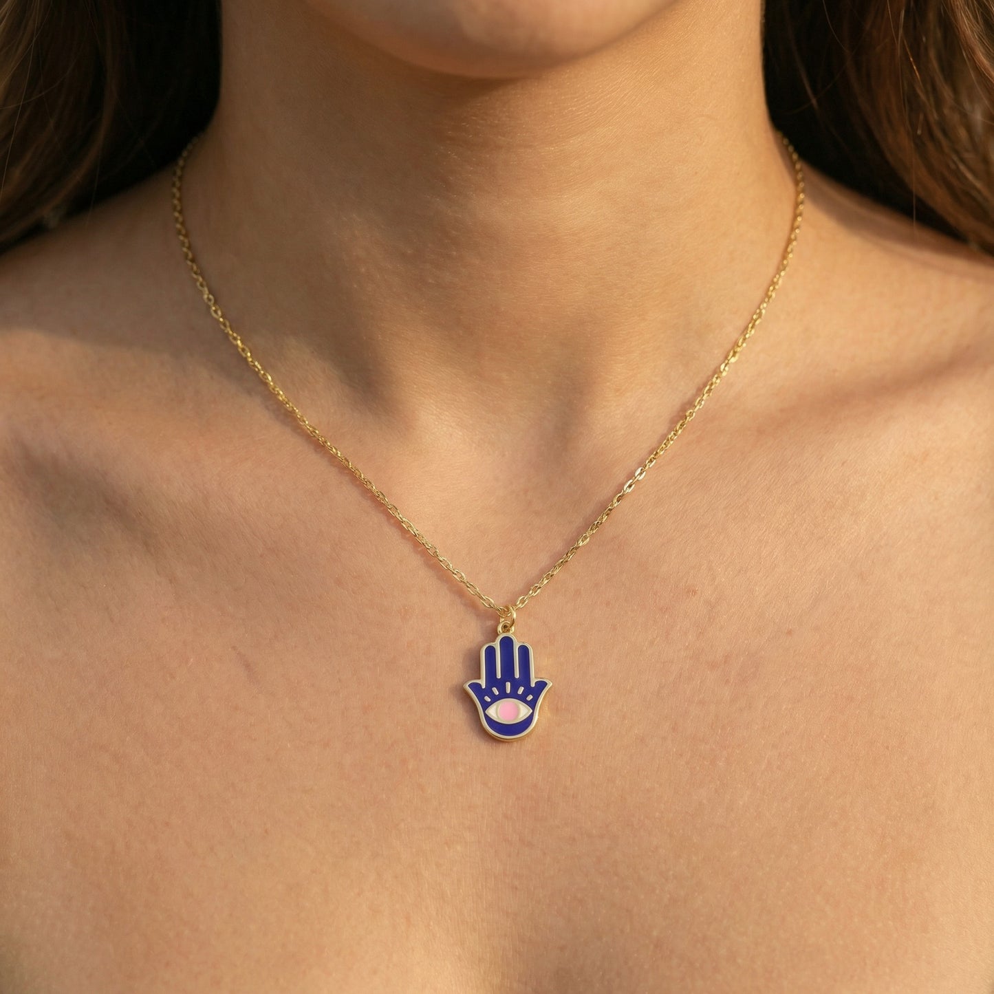 Protection hamsa necklace in high-polish gold plated with navy pink enamel evil eye by Alef Bet