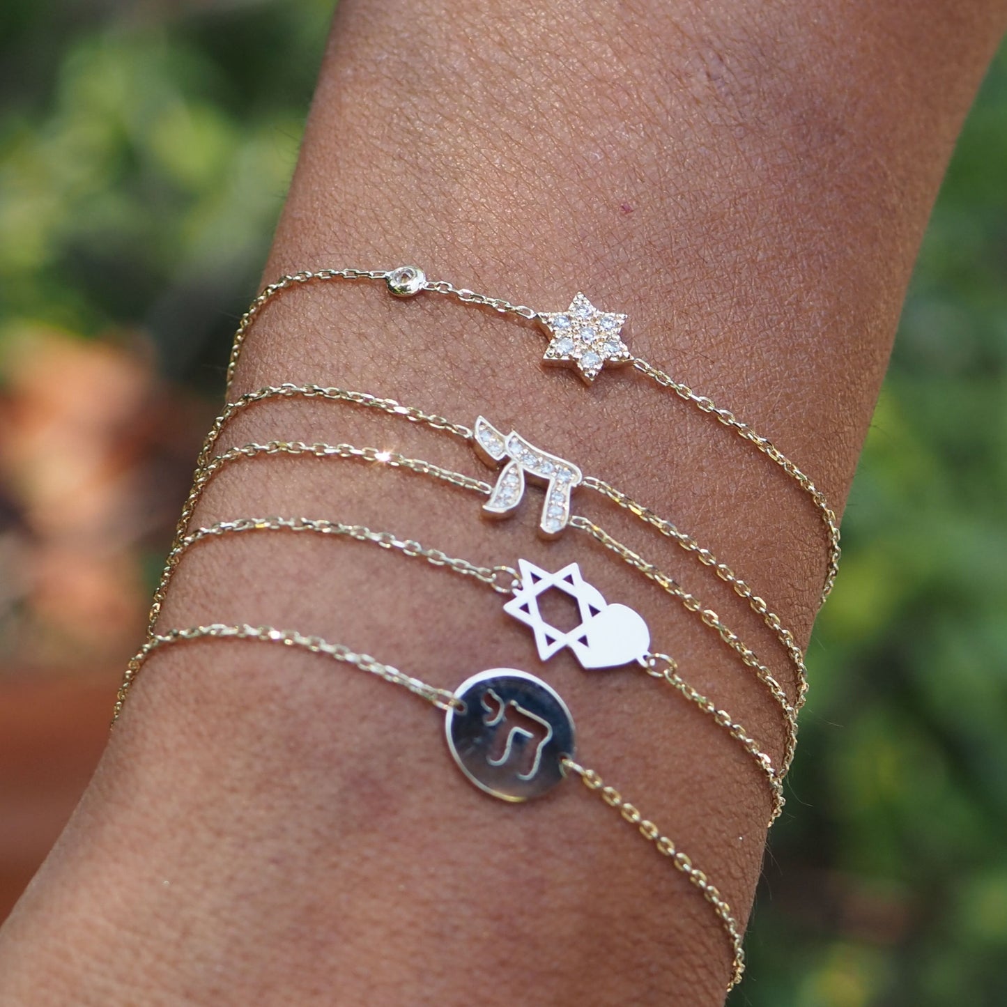 Diamond Star of David charm bracelet in 14k gold with pave setting by Alef Bet