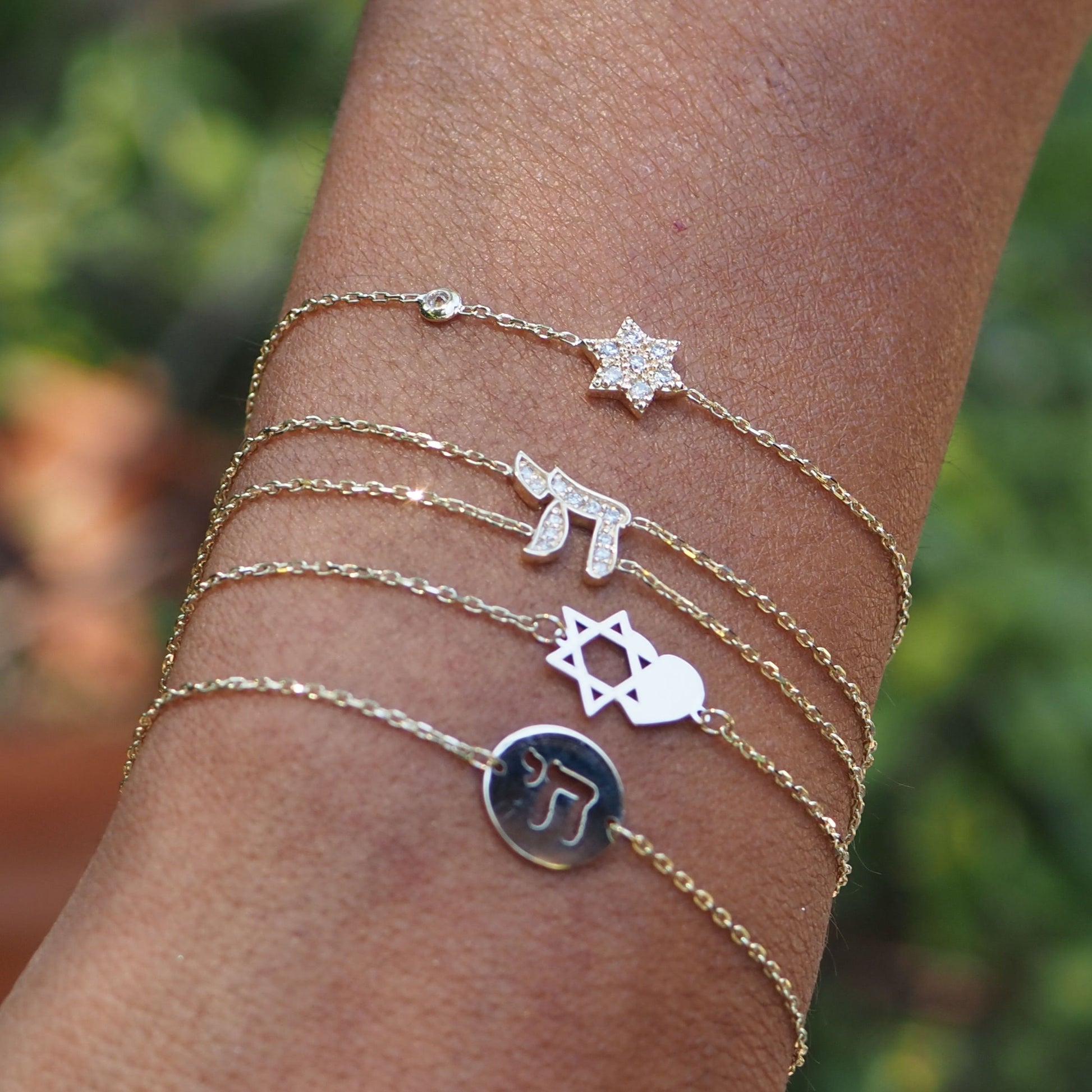Diamond Star of David charm bracelet in 14k gold with pave setting by Alef Bet