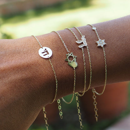 Solid 14k gold magen david bracelet, pave diamond star charm closeup by Alef Bet