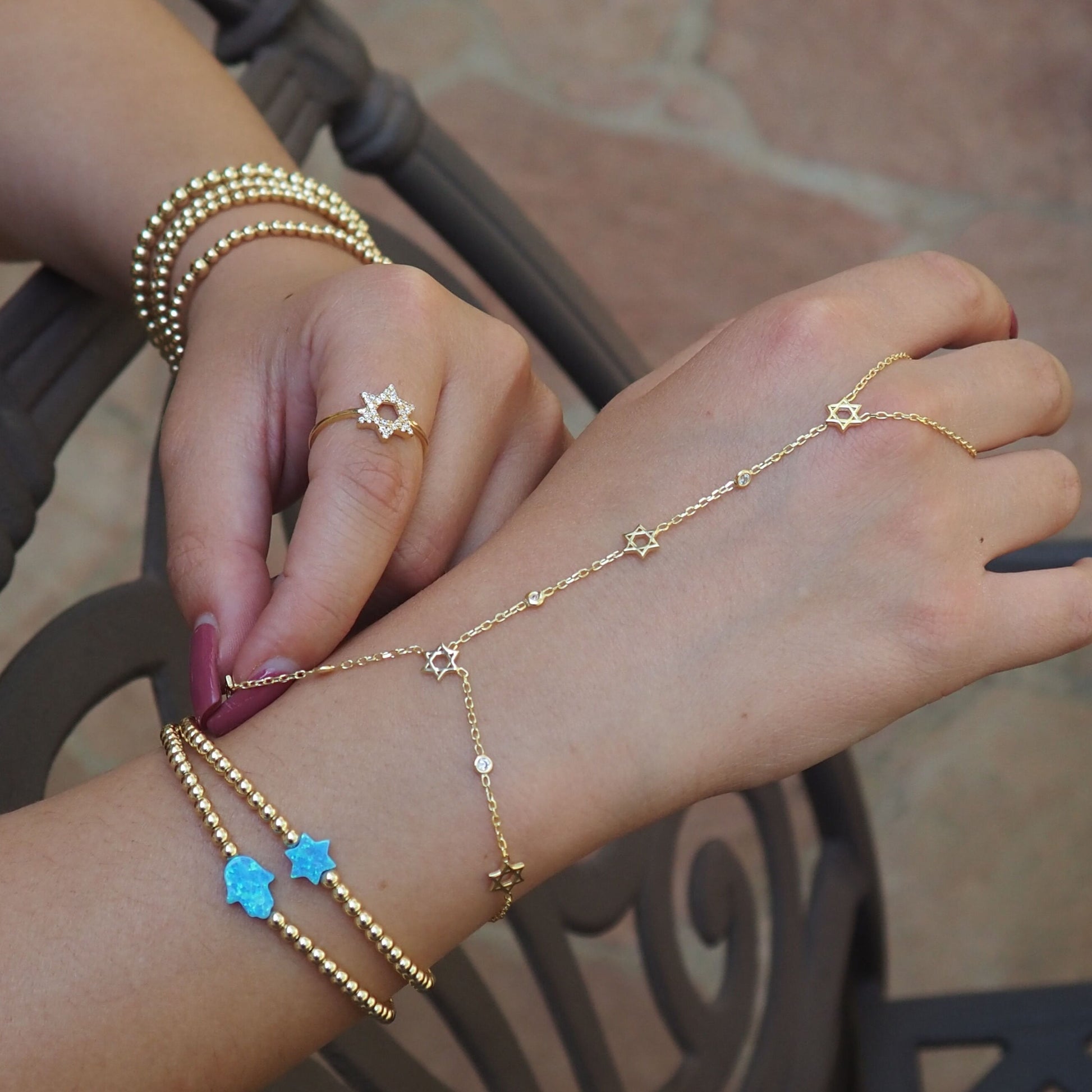14K gold Jewish Star ring featuring bezel-set diamond center stone, side view by Alef Bet