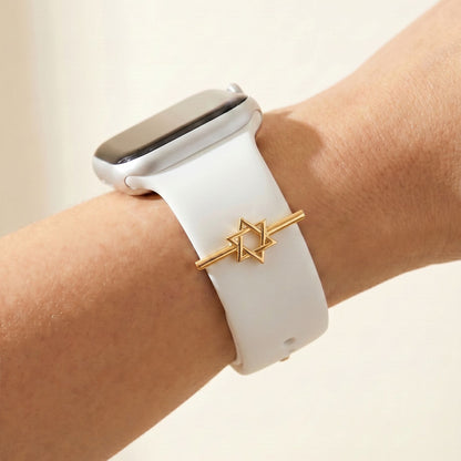 Smartwatch with a white band and Jewish star on a wrist against a beige background