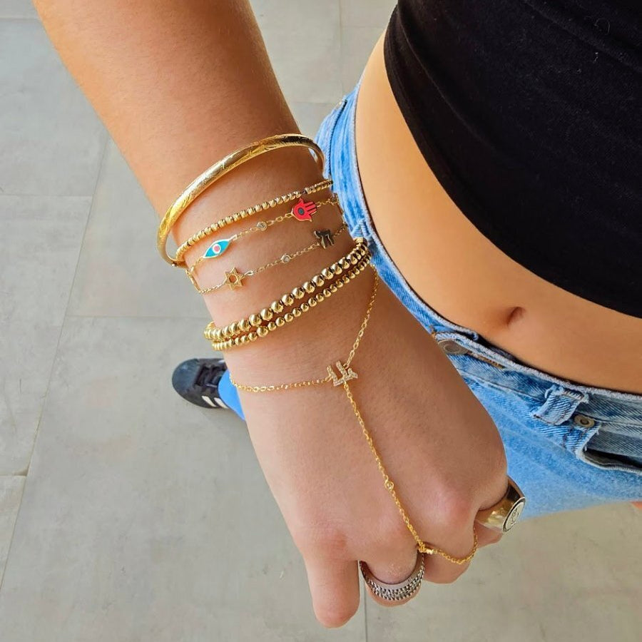 3mm yellow gold beaded bracelet showing spherical bead detail by Alef Bet