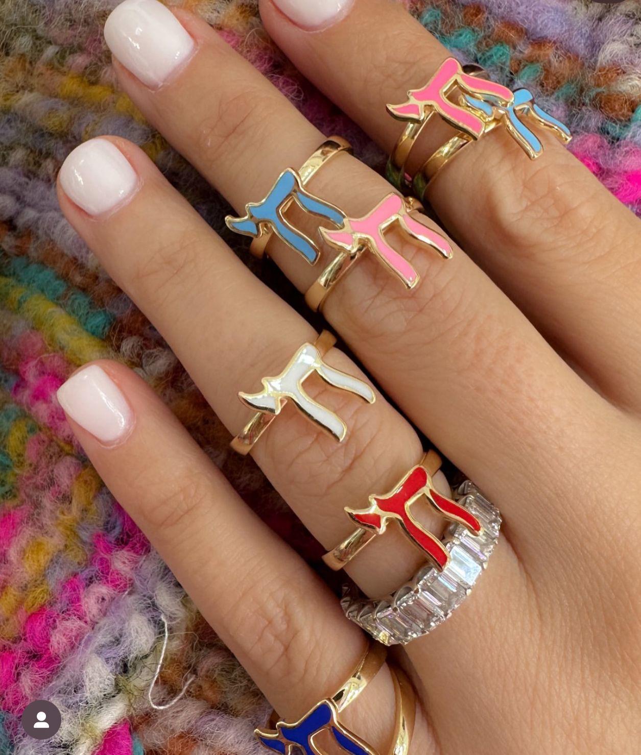 Yellow Gold Chai Ring showcasing the Chai symbol. A stylish reminder of love, luck, and happiness available in vibrant colors.