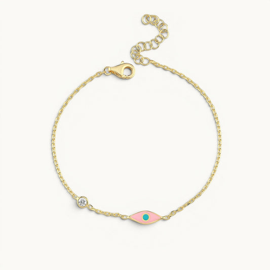 Evil eye bracelet in yellow gold plated with pink turquoise enamel by Alef Bet