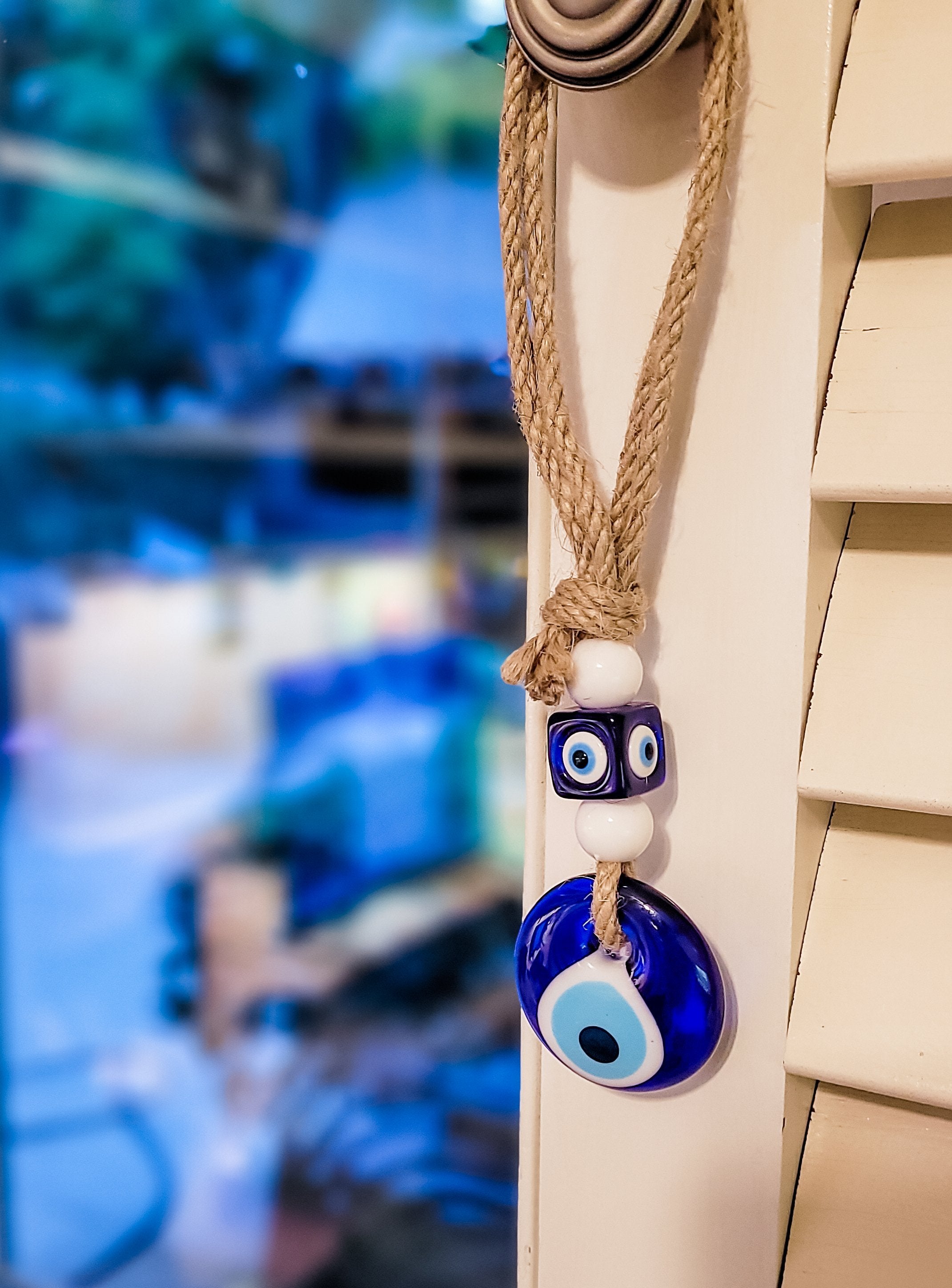 home amulet with evil eye charm