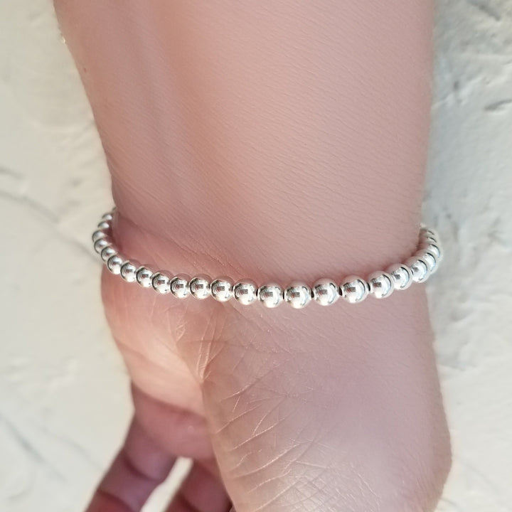 silver lucky bracelet