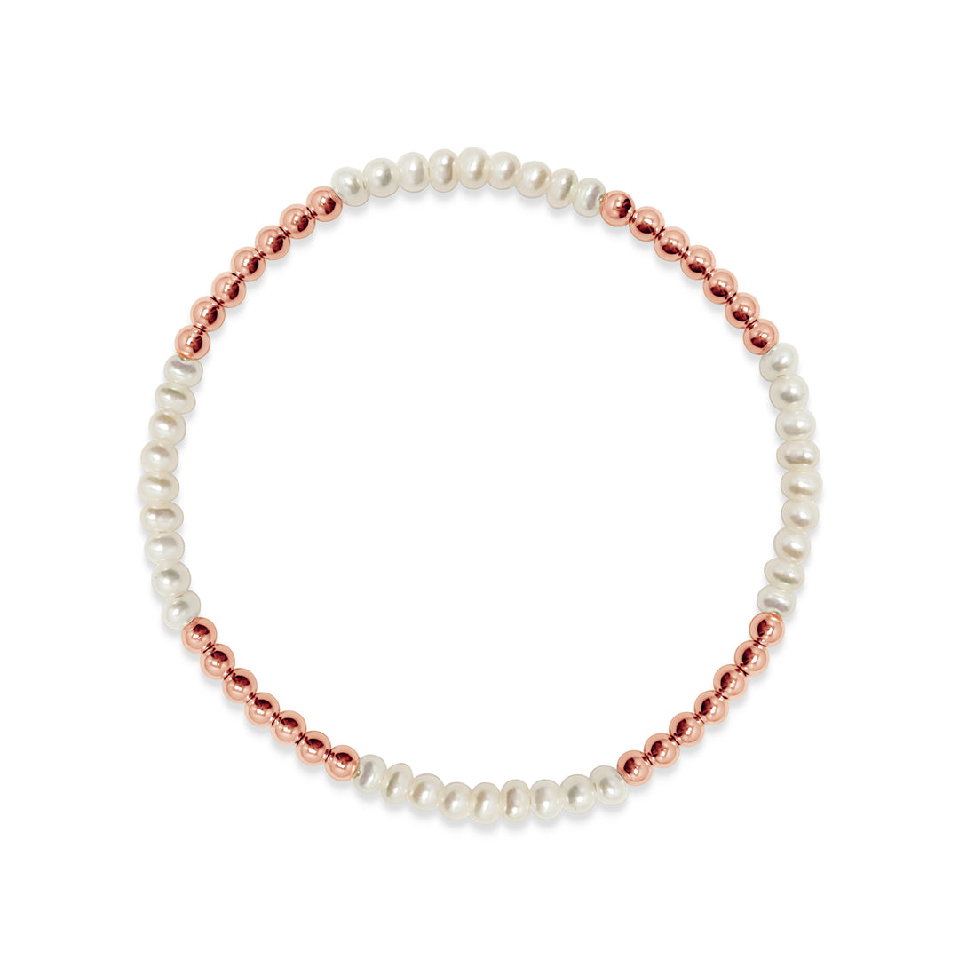 white pearl bracelet with rose gold beads