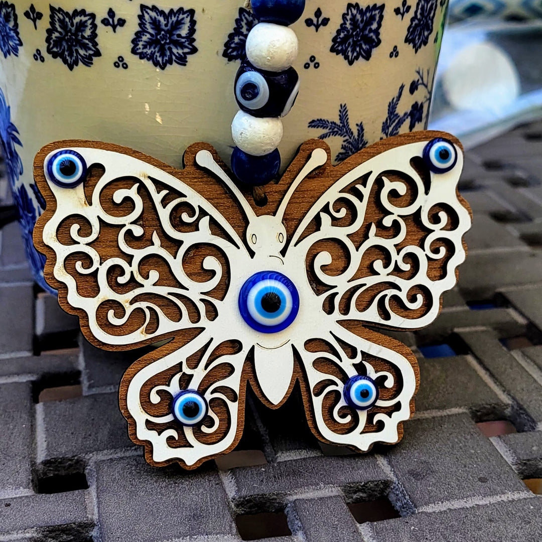 evil eye with butterfly for transformation
