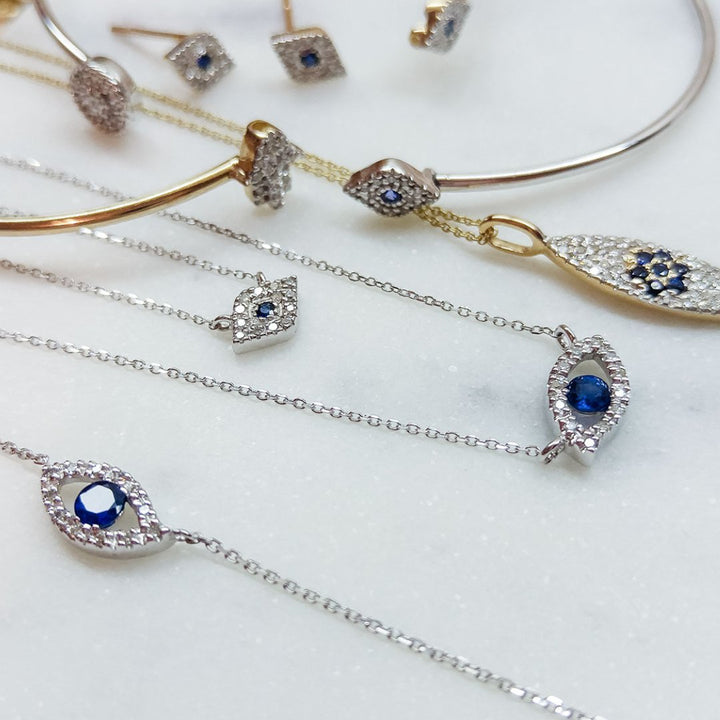 evil eye necklaces in gold and diamond