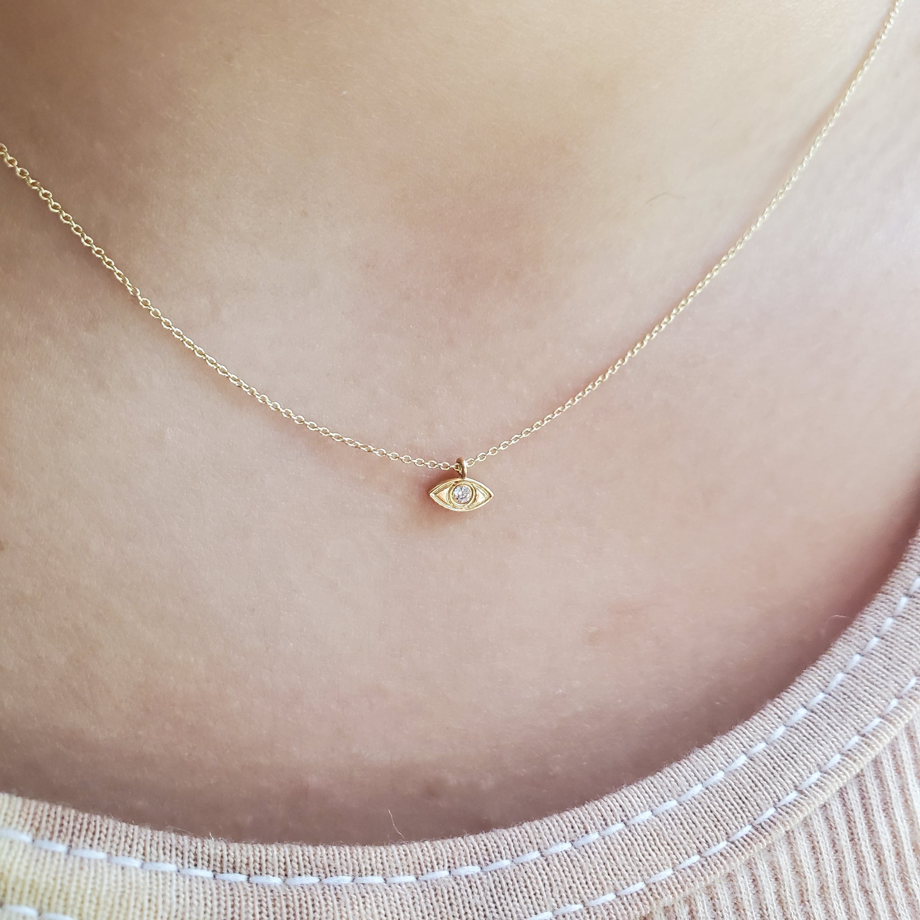 small evil eye necklace gold
