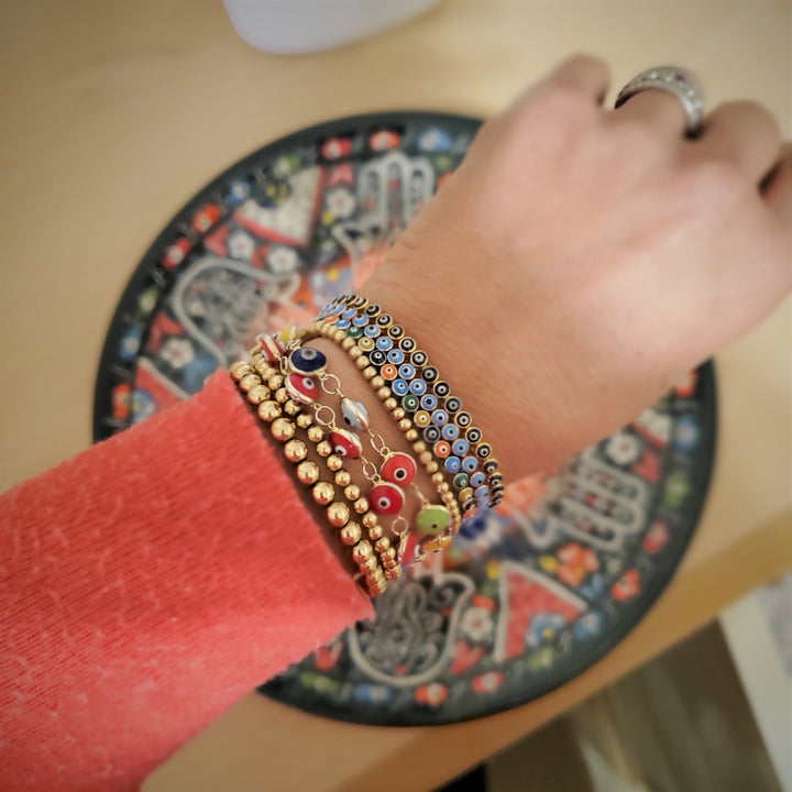 arm party in yellow gold