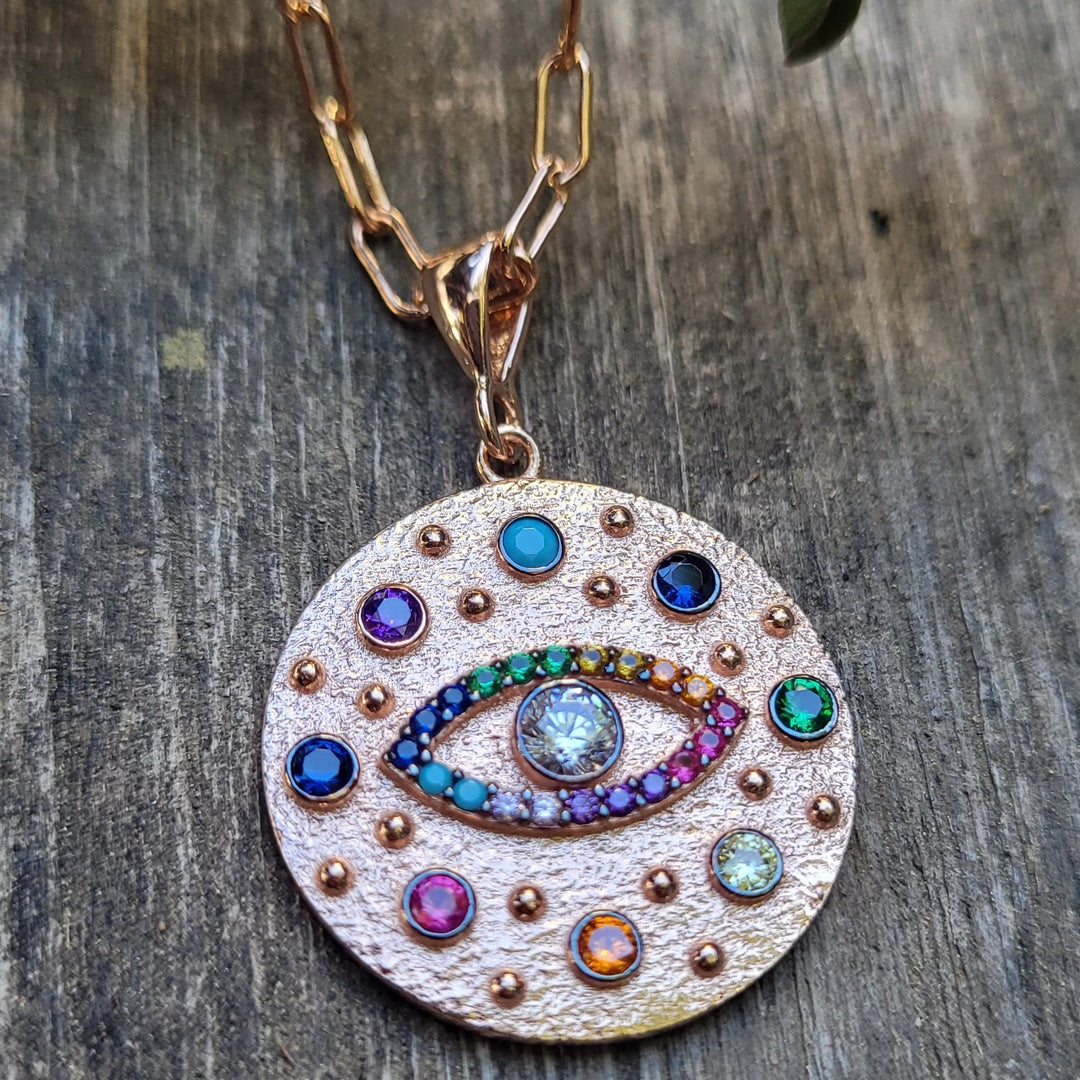 evil eye charm necklace in rose gold