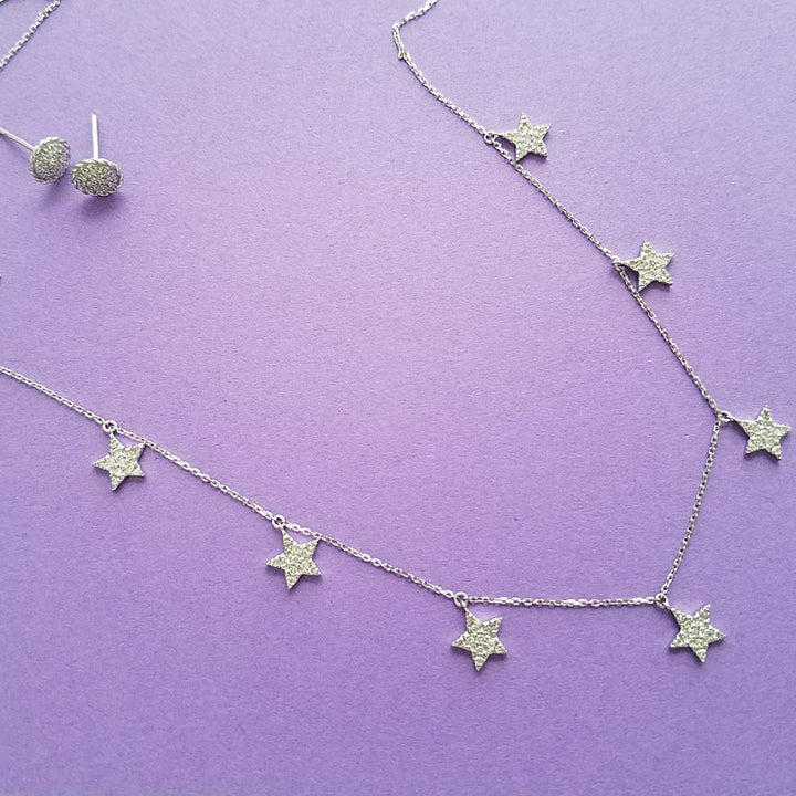 star charm necklace in gold and diamonds