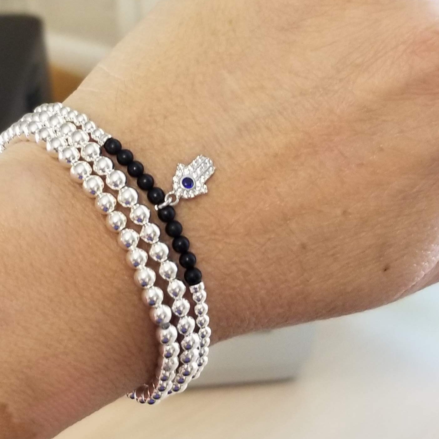 silver hamsa bracelet for yoga lovers