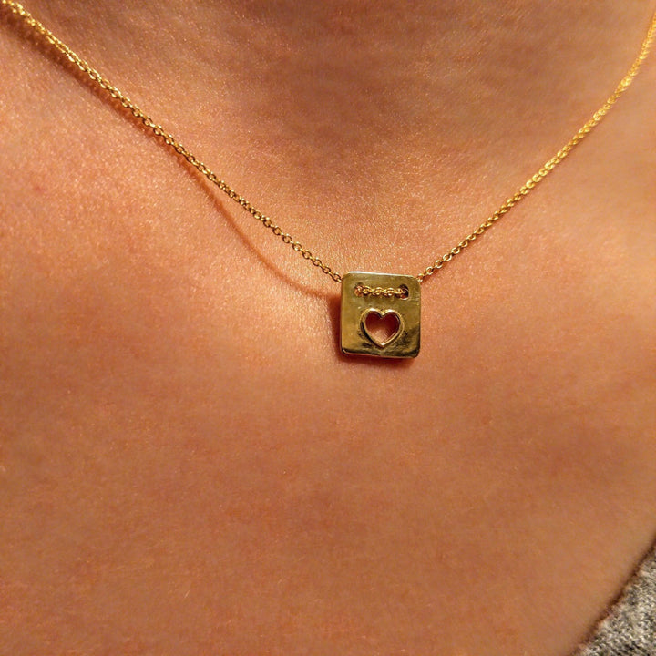 gold heart charm necklace