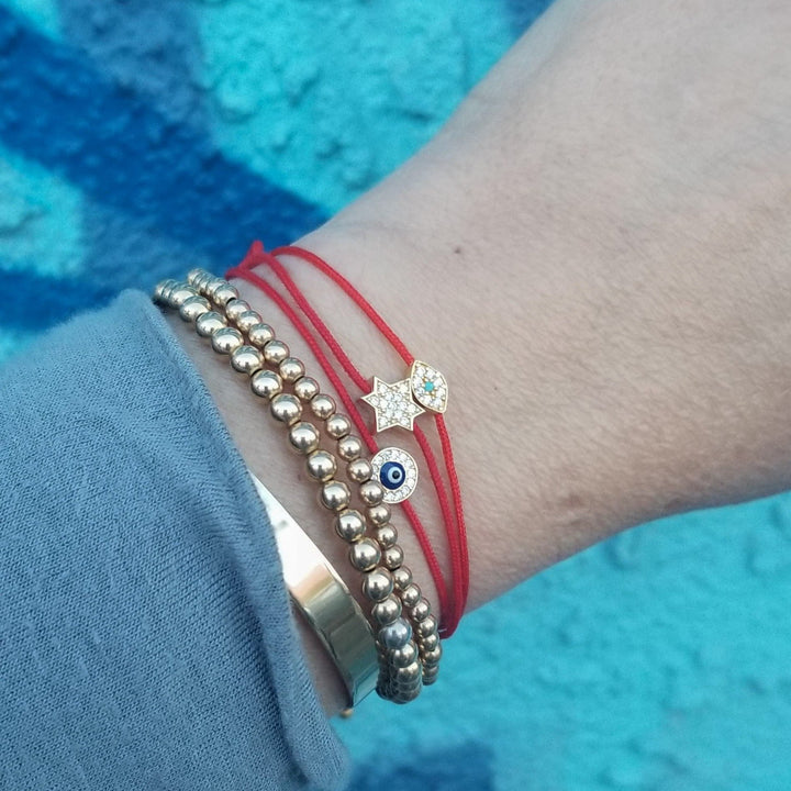 red multi cultural bracelet