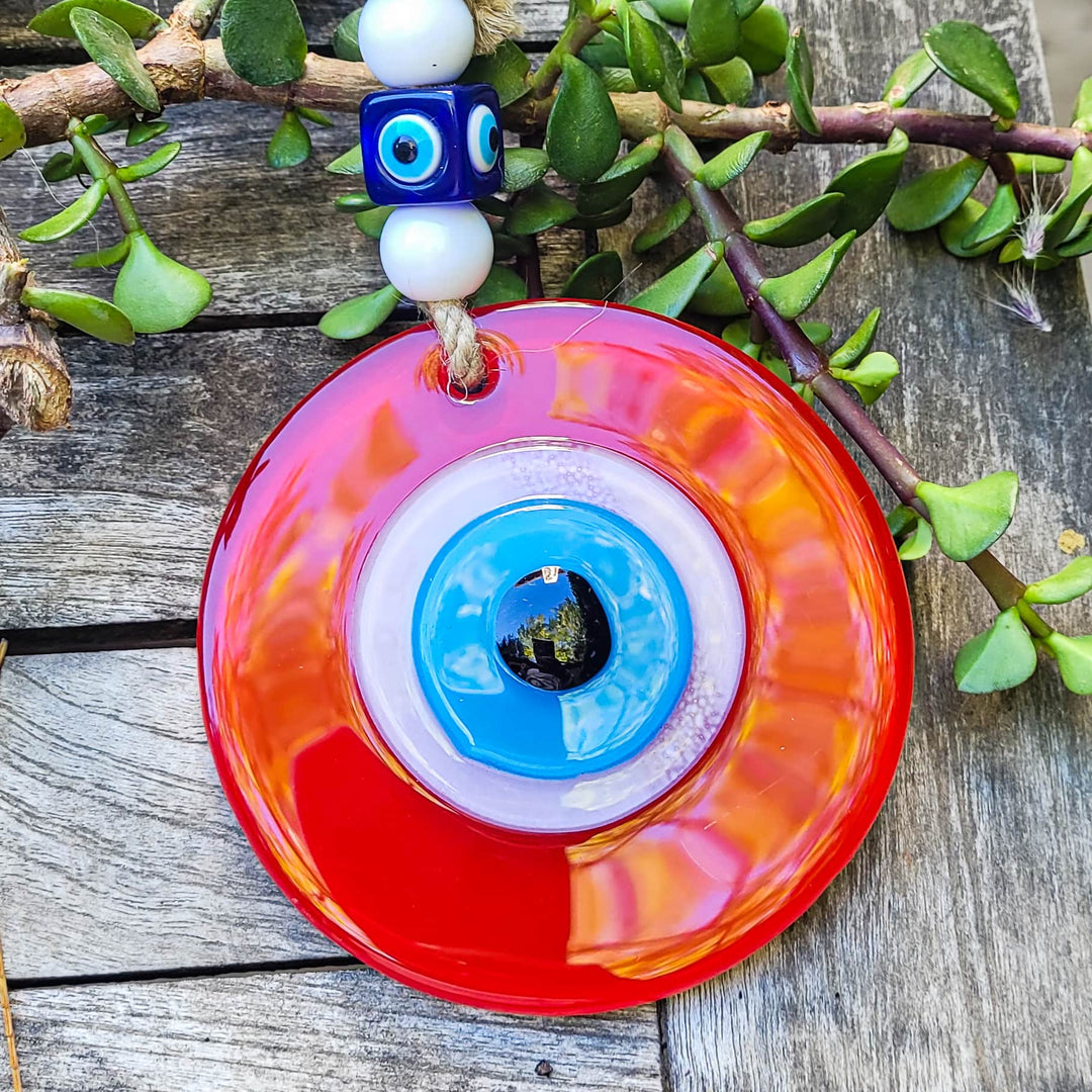 red evil eye wall hanging