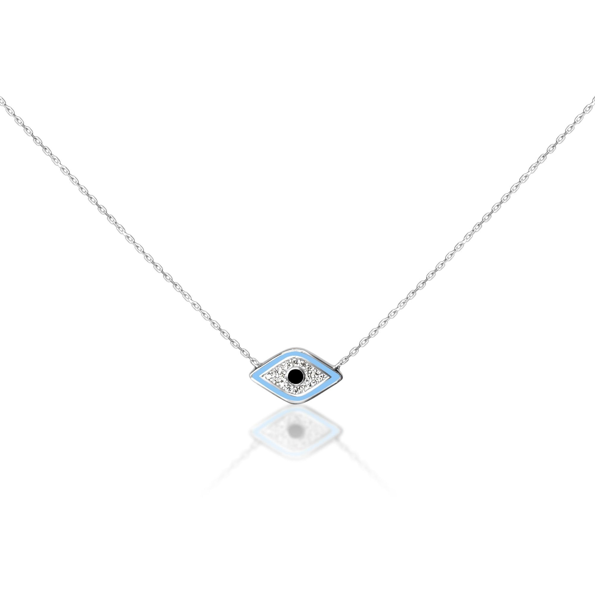 silver pendant with evil eye charm