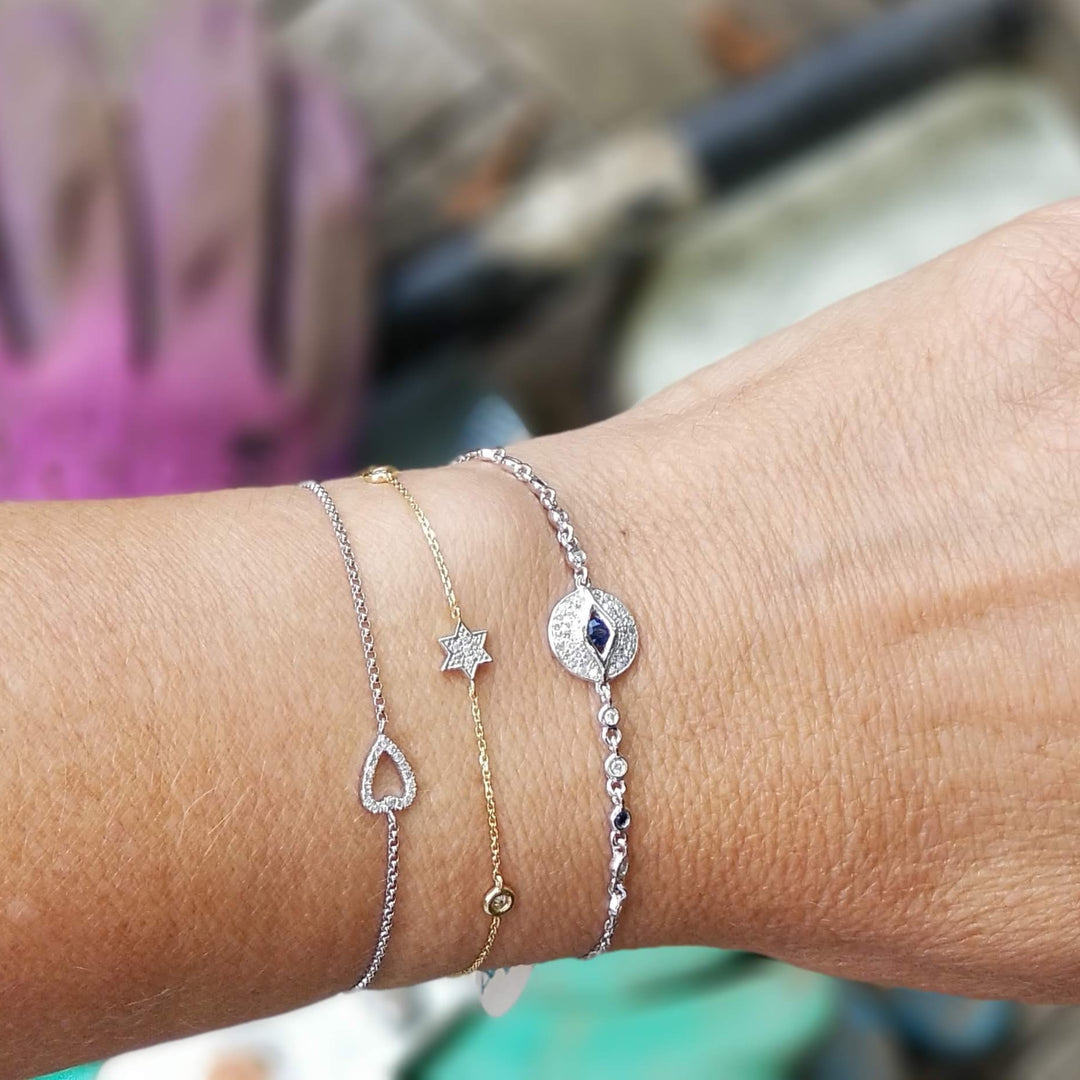 heart, eye, and star bracelet