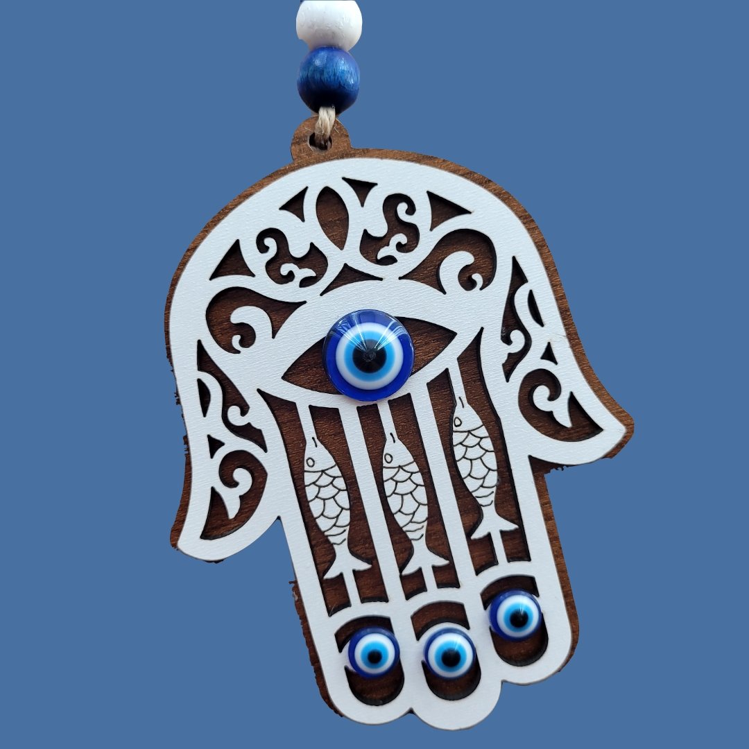 wooden amulet with hamsa